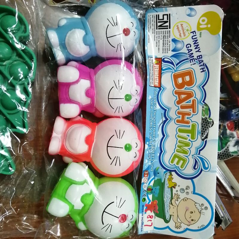 MAINAN DORAEMON KARET PENCET BUNYI