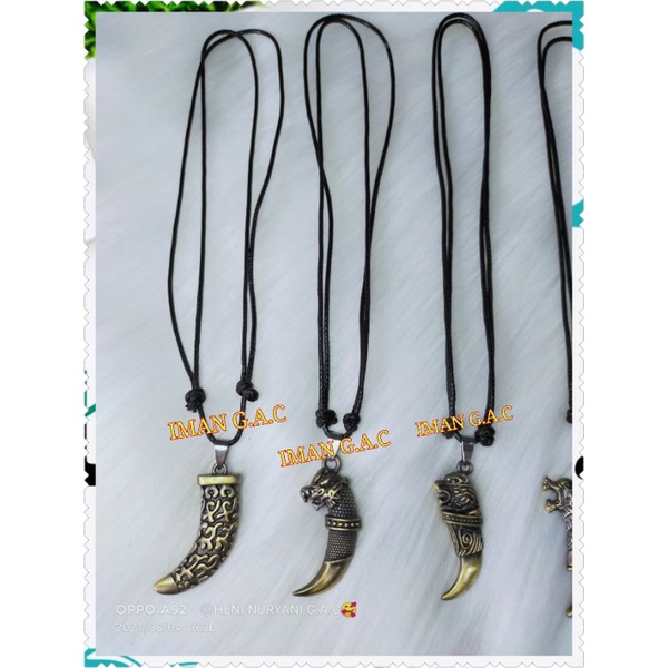 kalung taring serigala full besi.kalung fashion peria. kalung taring serigala tali import korea