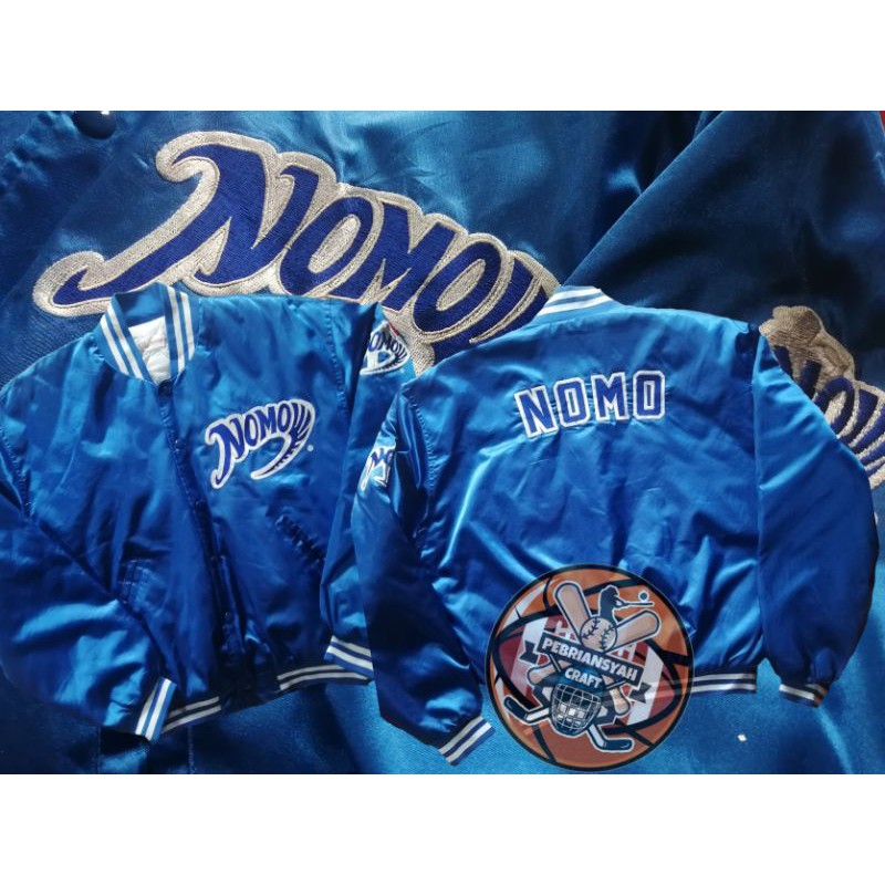 varsity Nomo