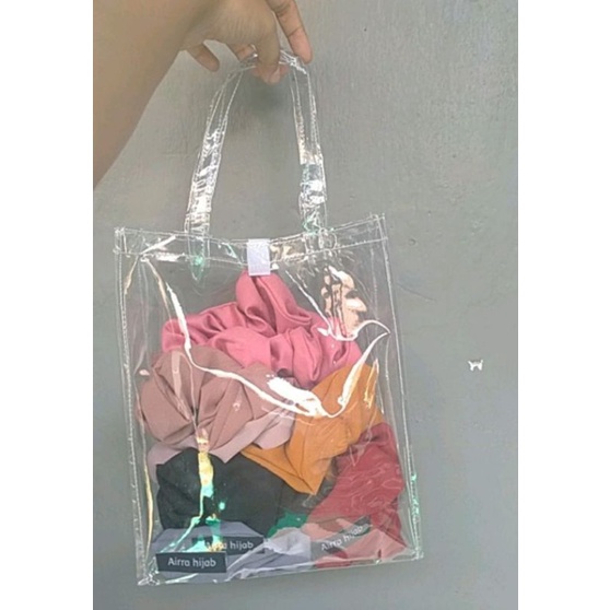 

Tas MIKA Full Transparan PARCEL LEBARAN P.20 X L.10 X T.25 Potret