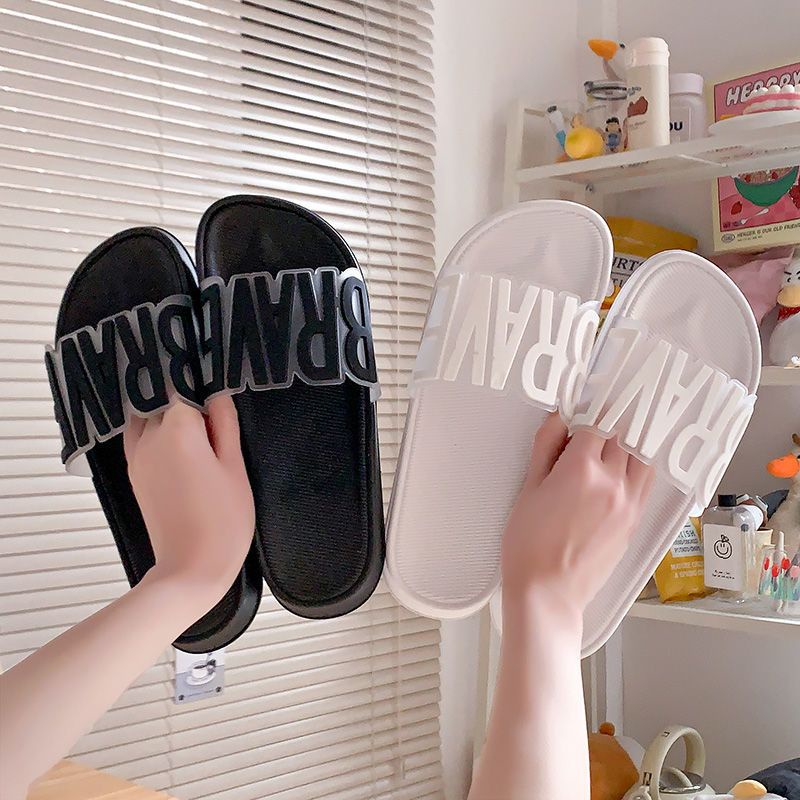 IDEALIFESHOES TOKO SANDAL WANITA IMPORT TERBARU MODEL SLIP ON BERTULISAN BRAVE  WARNA PINK DAN PUTIH BAHAN PVC KARET ANTI SLIP