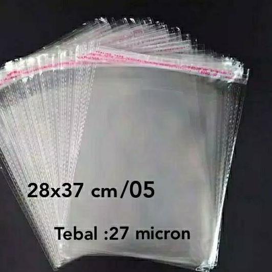 

Plastik Bening Tebal OPP Baju seal lem uk 28 x 37 cm /05 isi 100 lembar tebal: 27 mikron