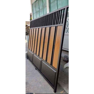 pagar besi kombinasi motif kayu