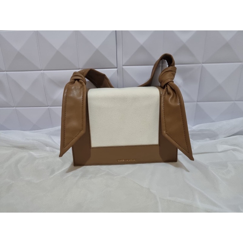 PRELOVED CHARLES AND KEITH