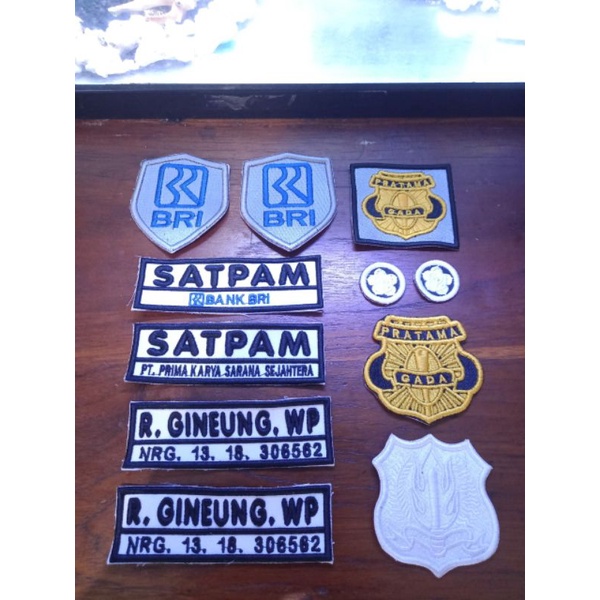 BET SATPAM,NAMA,GADA PRATAMA ,KEWENANAGAN,MONOGRAM satpam ,LOGO BRI