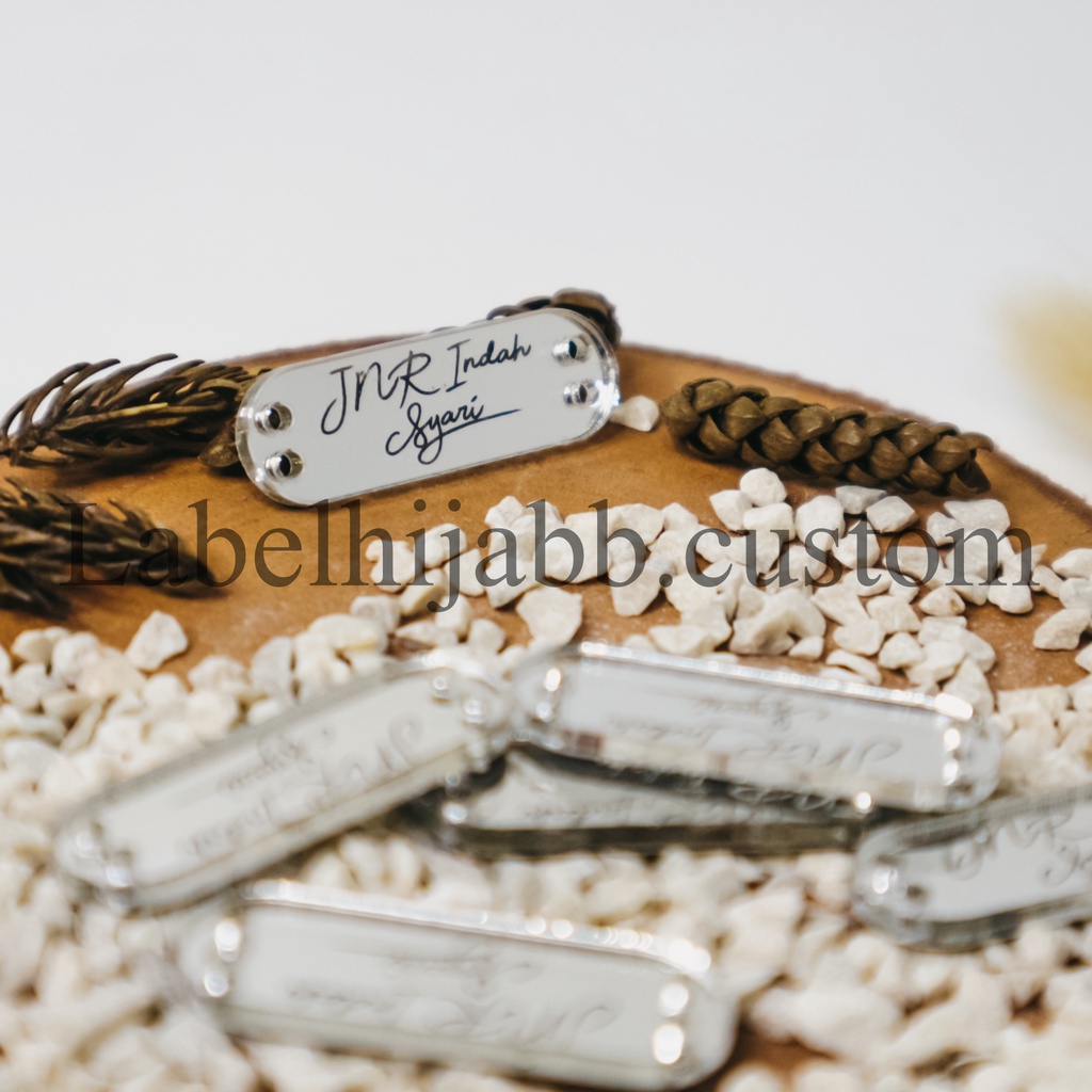 

label hijab | label baju | label akrilik | custom label | label jilbab | label cutting | Label Silver