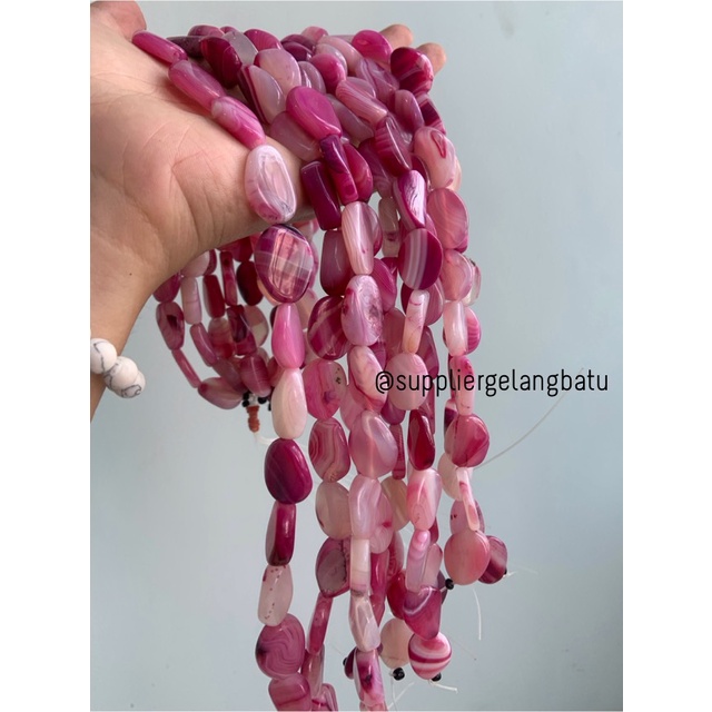 batu alam Penden simba oval pink carnelian 1 x 2 cm warna merah muda