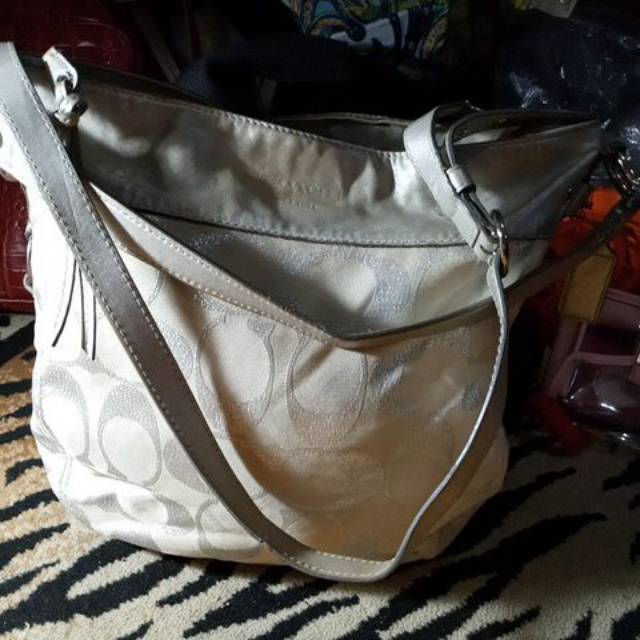 Tas coach putih silver