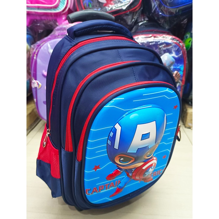 Tas DORONG Trolley Anak Sekolah TK / Play Group / PAUD SUPER JAGOAN HERO - BUAYA DINO DINOSOURUS - ROBOT ROCKET TIMBUL GLOSSY 3 RESLETING IMPORT ( Luwi Gogo Kumbang 12inch )