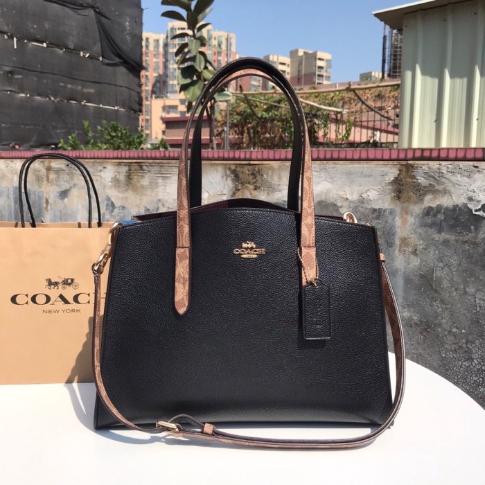 Coach women Charlie Carryall In Signature canvas - Putih