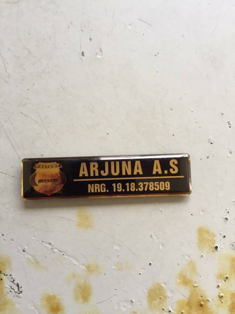 

Papan Nama Dada