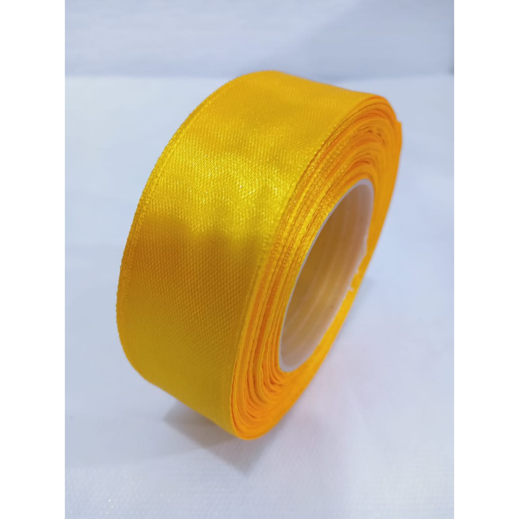 

Pita satin kuning 1 inch / 2.54 cm Per roll