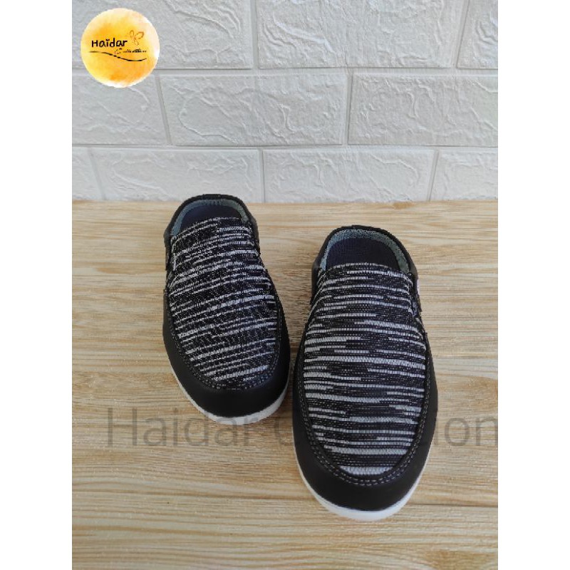 Selop Bustong Pria Kulit Rajut Sintetis Slip On Kasual Cowok Sol Karet Lentur Original Premium