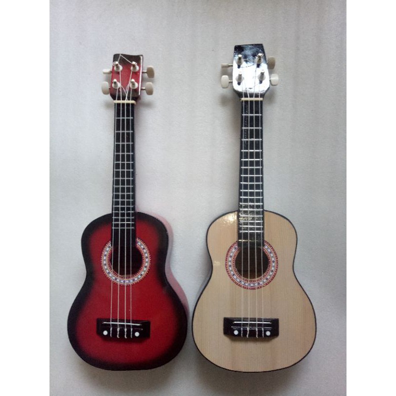 ukulele kencrung senar bagus bonus pick paking dua lapis