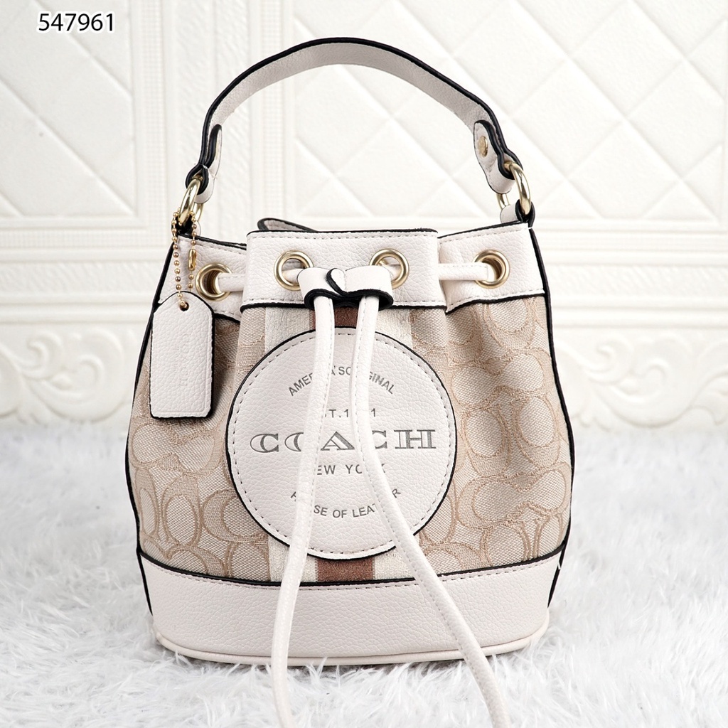 Coa Mini Dumpsey Bucket Bag 547961