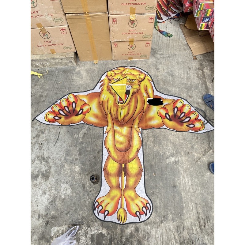 layang layang kain lipat singa