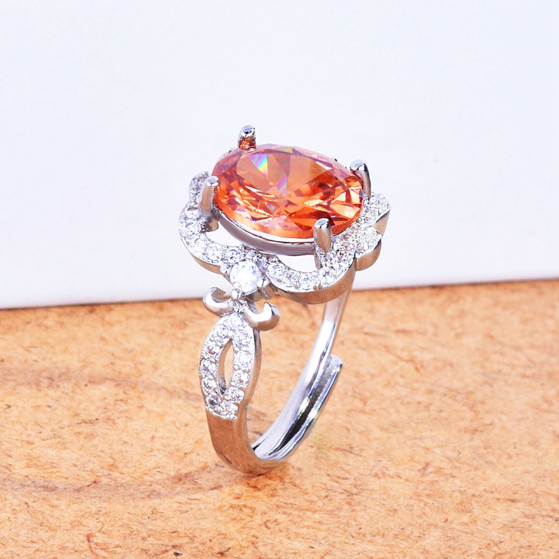 Cincin Desain Geometri Hollow Hias Batu Zircon AAA Warna Oranye Adjustable Untuk Wanita