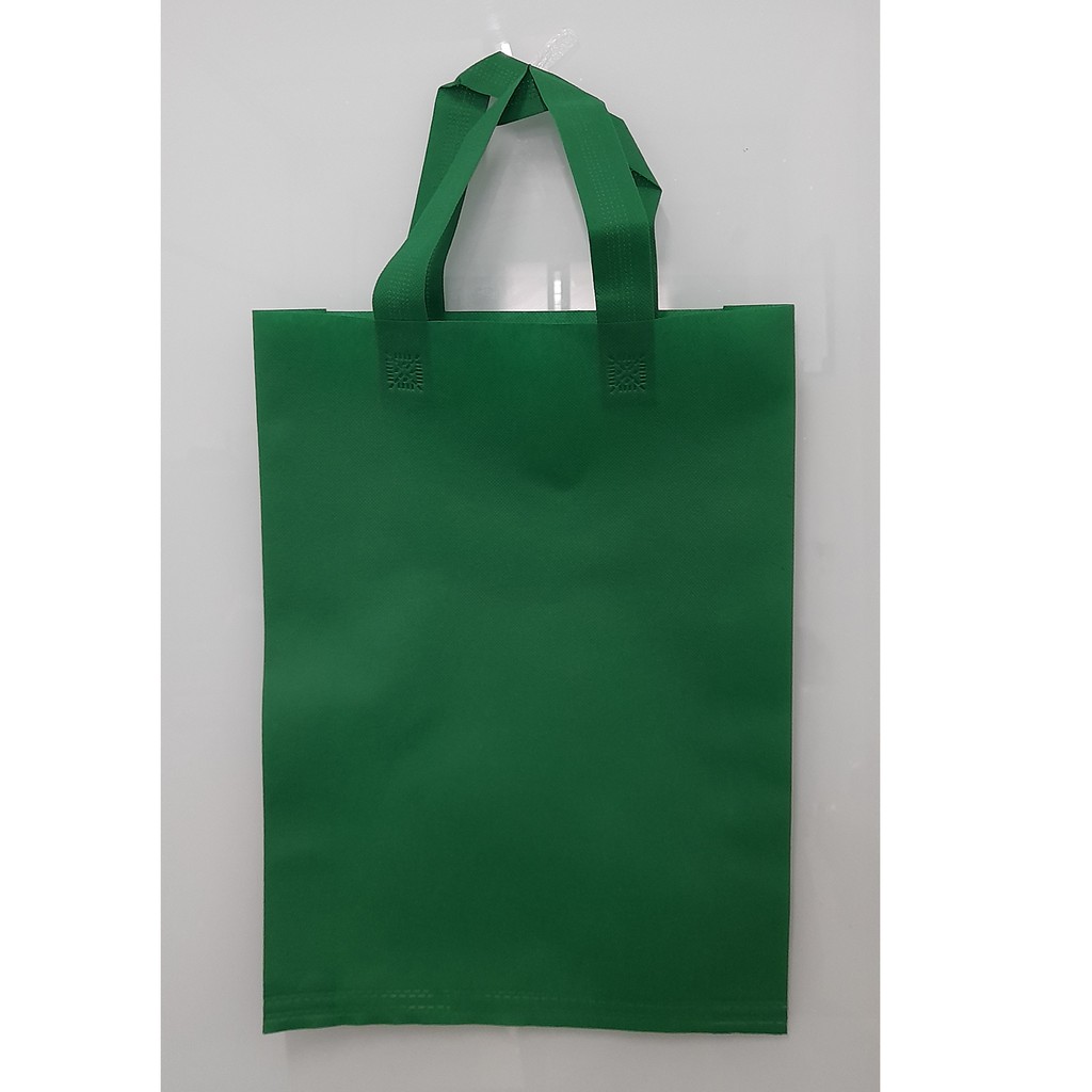 

Tas Press Spunbound Tali Goodie Bag Tas Belanja Warna Hijau Tua 30 cm x 40 cm