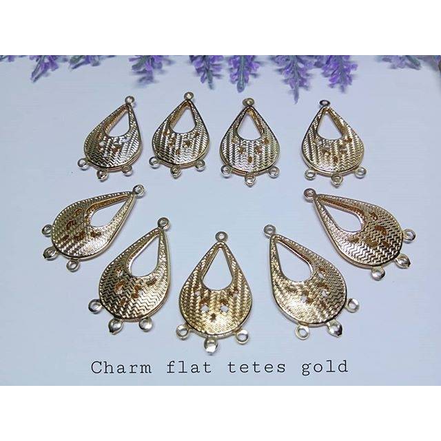 Charm flat tetes gold