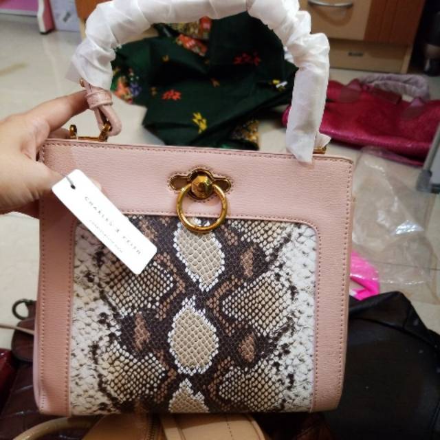 Charles and Keith snake baby pink bag