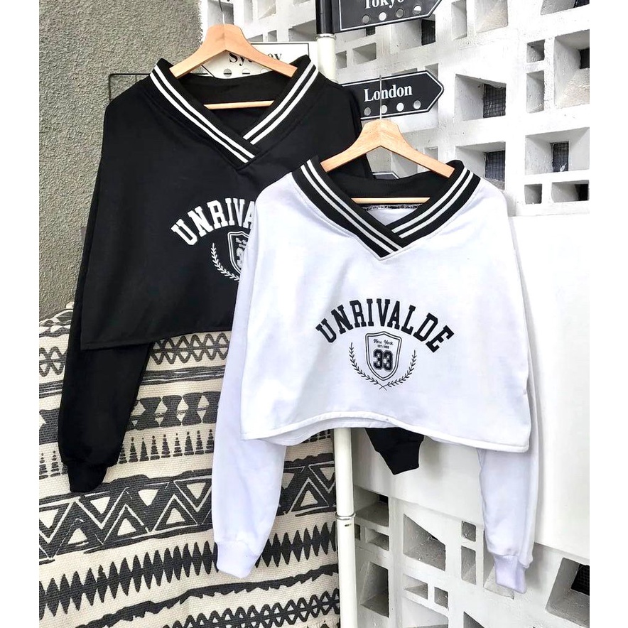 Unrivaled crop sweater berbahan fleece print