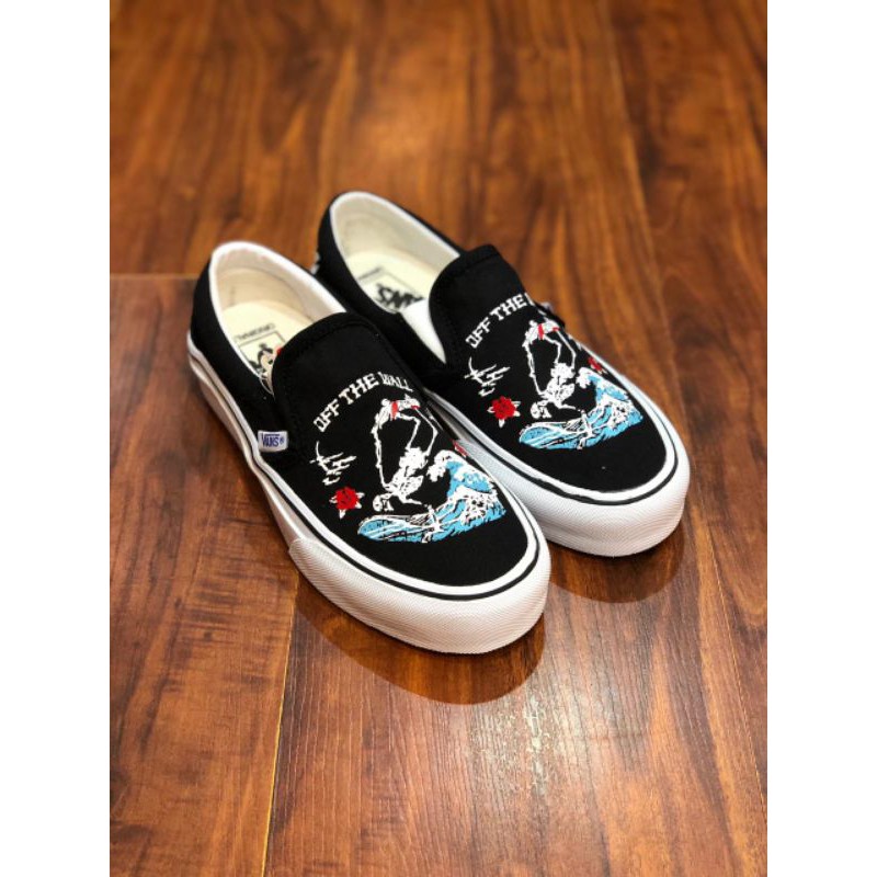 skeleton vans slip ons