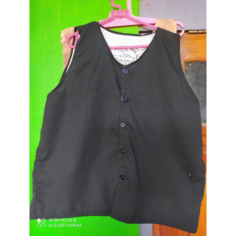 rompi tulisan tangan rajah