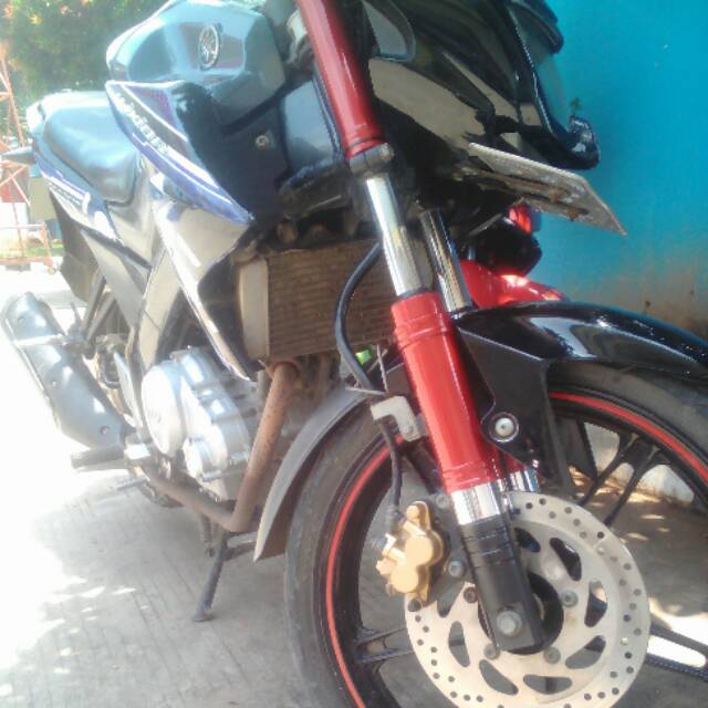 Cover shock Vixion motif tabung variasi