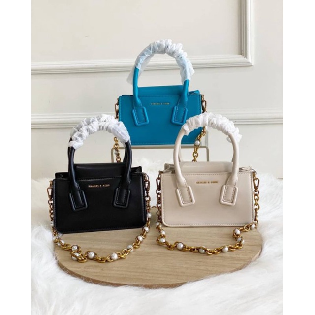 CK Chain Pearl Top Handle Bag