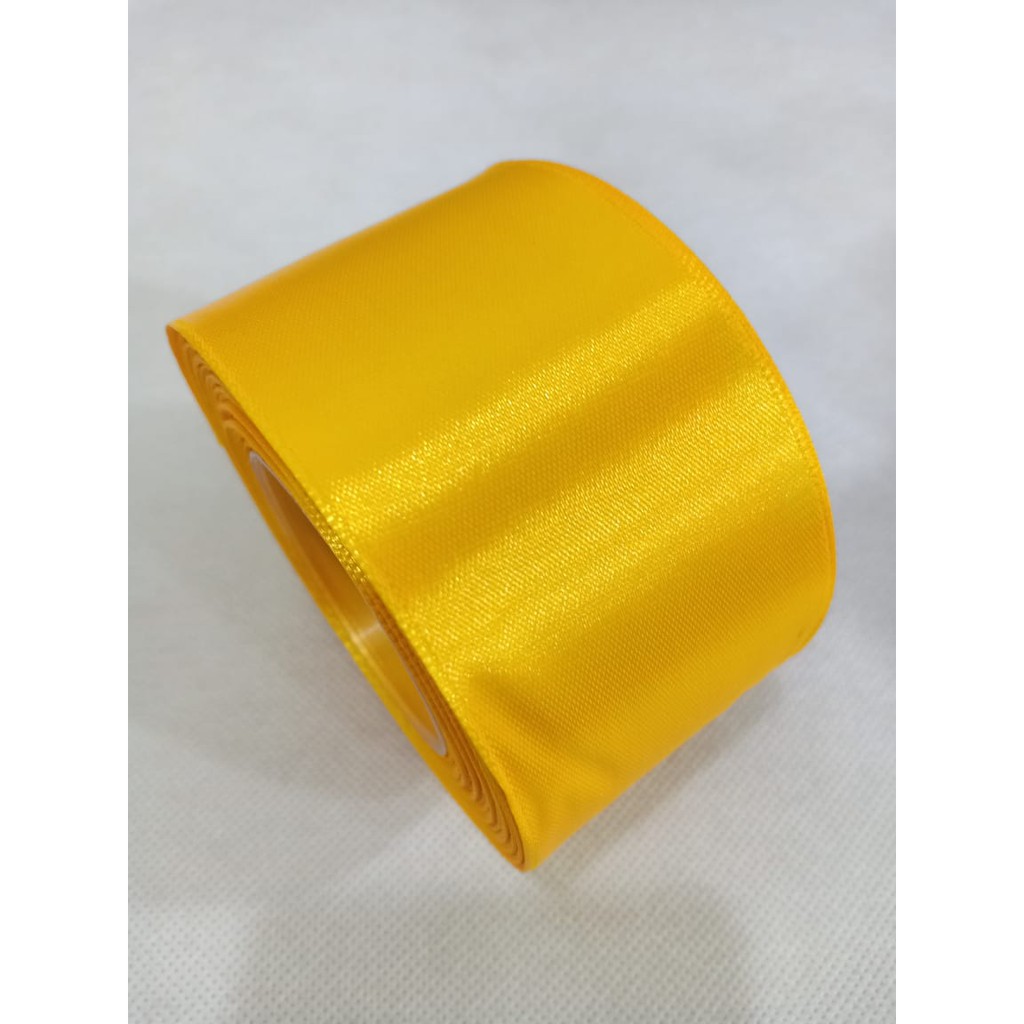 

Pita satin kuning 2 inch / 5 cm Per roll