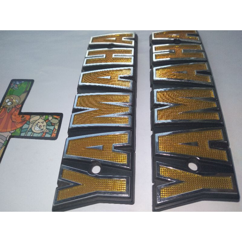 PART RX100/RX K,SET EMBLEM TANKI RX100/RX K ORIGINAL JAPAN