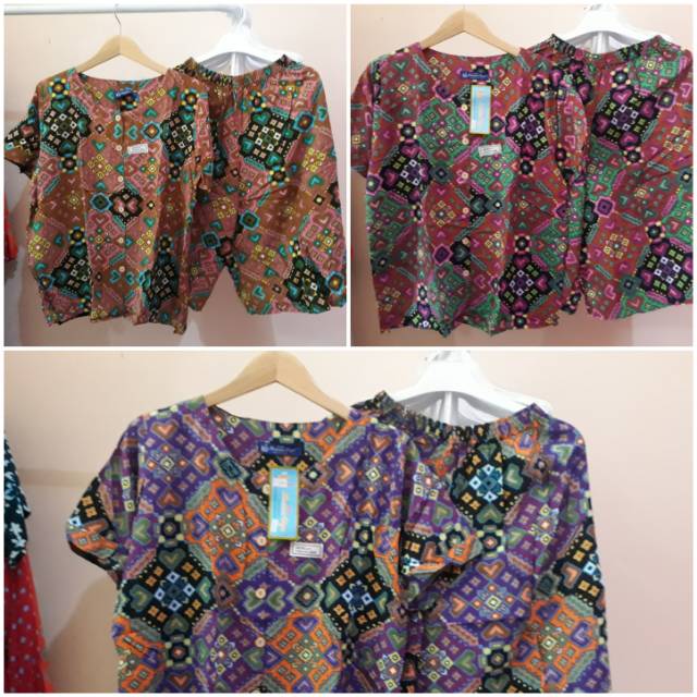 Setelan celana pendek kencana ungu