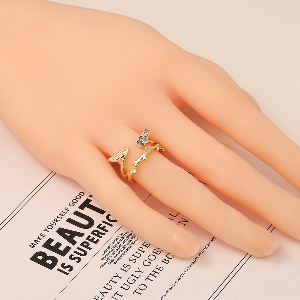 Eropa dan Amerika perhiasan tembaga 18K emas bulu sayap terbuka cincin berlian kreatif pribadi perhi