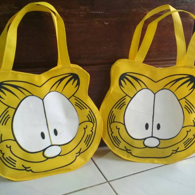 Tas souvenir ultah anak model tenteng kepala kartun