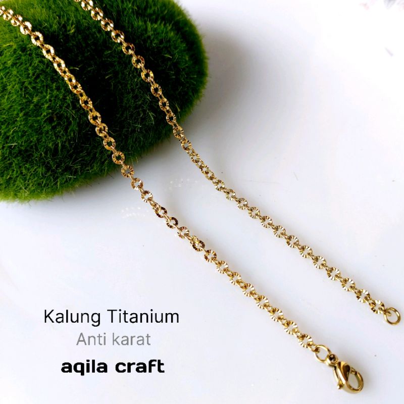 KALUNG TITANIUM SINARAN GOLD