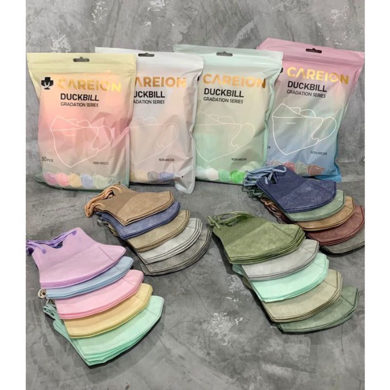 MASKER DUCKBILL CAREION GRADASI WARNA 4 PLY ISI 50 PCS