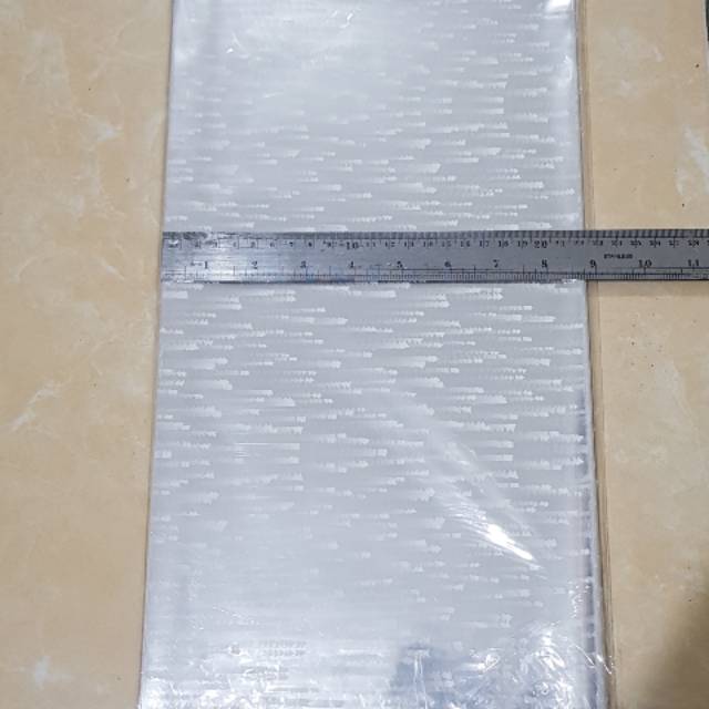 

Kantong parcel plastik parcel goodybag 22x42 cm