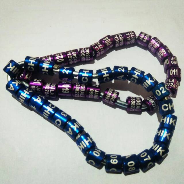 mUrrAh Ring perkutut tipe laser.bisa pesan nama,no hp,no urut.harga per 1set/25 biji