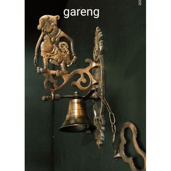 Bel lonceng pintu antik motif wayang gareng