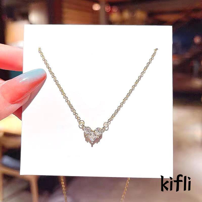 Kalung Liontin Hati Bahan Titanium Steel Aksen Zircon Untuk Wanita