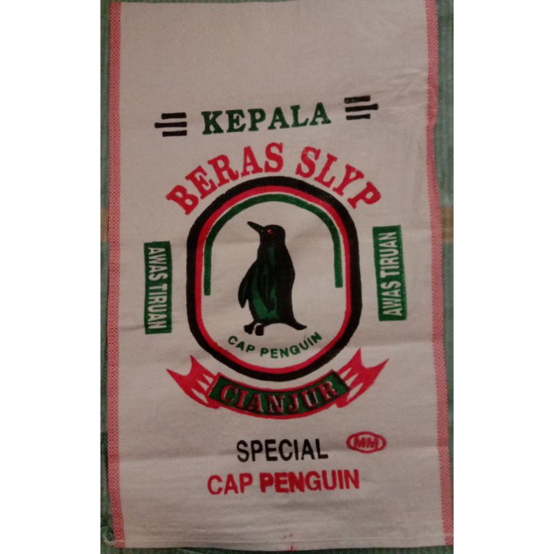 

karung beras pinguin polos / putih susu 25kg(ini kemasan bukan beras )