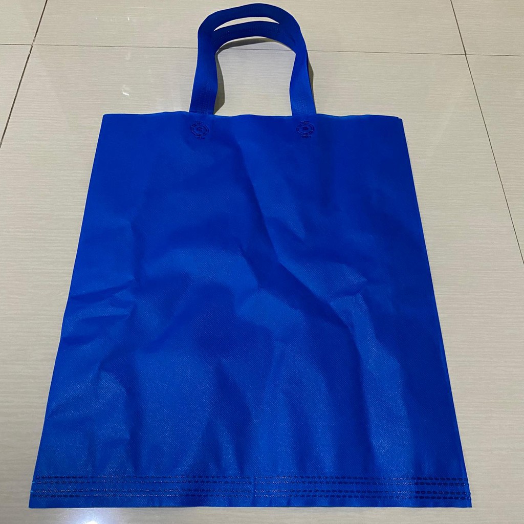 

Tas Handle Kain / Spunbond / Goodie Bag 38 X 45 (L)