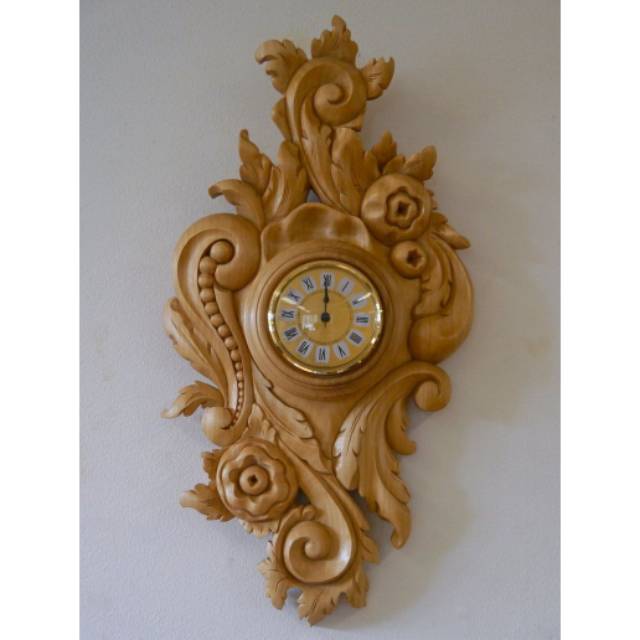 Jam dinding Ukiran kayu