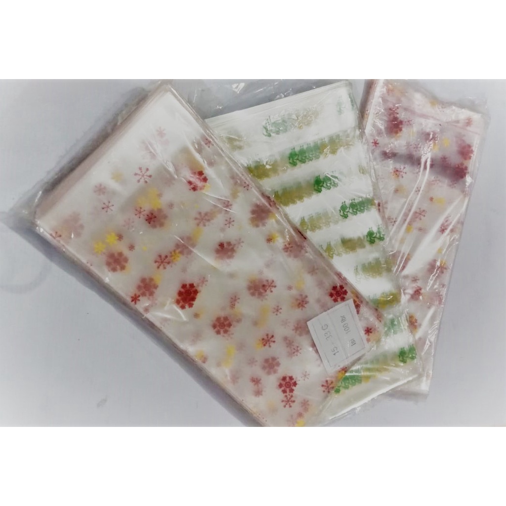 PLASTIK DUDUK OPP MOTIF UK. 15 x 33 / PLASTIK JAJAN LEBARAN ISI 100 PCS