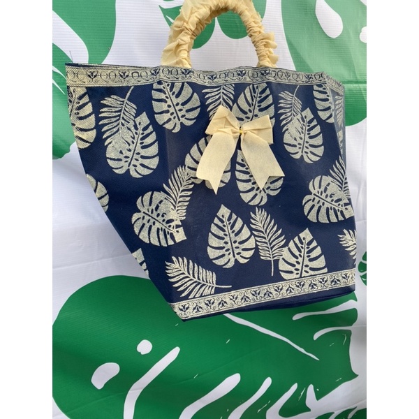 HARGA LUSIN ISI 12 BIJI     TAS HAJATAN/RENDA 22 MOTIF DAUN JANDA BOLONG