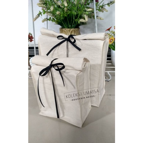 

Tote roll kantong tas souvenir kain custom polos atau sablon