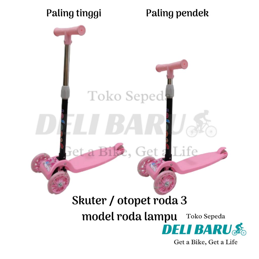 Skuter otopet anak model roda lampu nyala pink dan biru muda