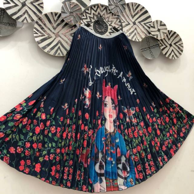 Rok plisket motif import