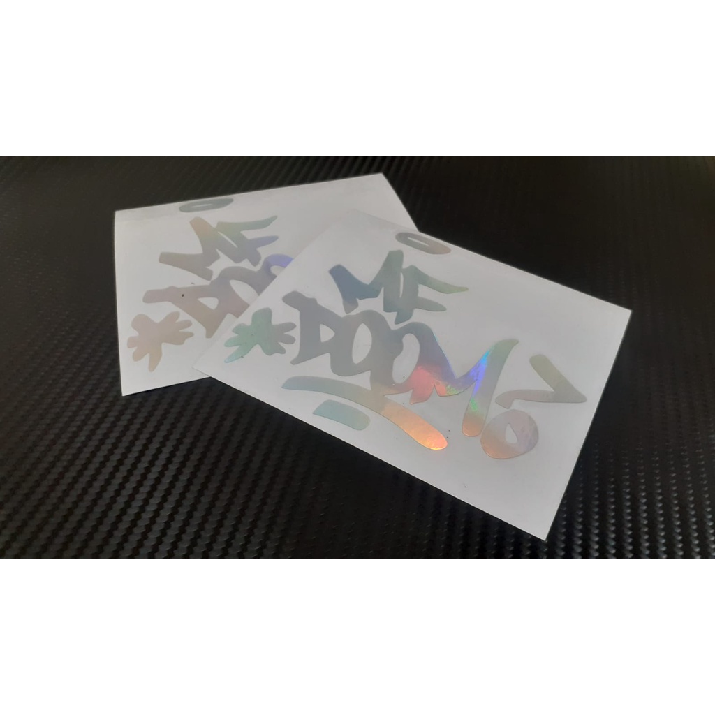 STIKER LOGO MF DOOM HOLOGRAM DAN WARNA CUTTING STICKER