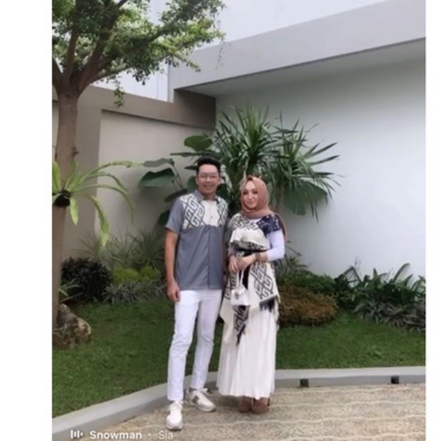 couple andin tenun putih